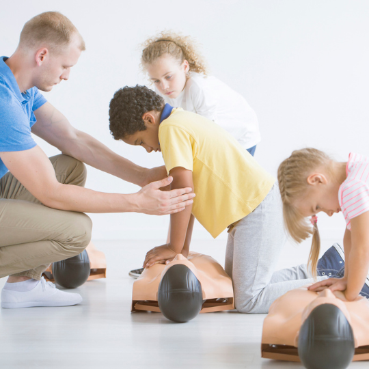 73_9282_05Jun2023135131_Children learning first aid skills 540px.png
